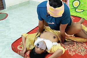 Desi bhabhi in saree moans romantically as hubby fucks kitchen style.