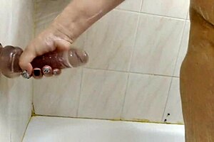 A Mature Bitch Showers Sucks Dick Rubs Sperm On Her Big Tits