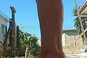 Stepmom flashes pussy in garden public no panties?