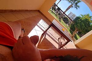 stepmom jerks off stepsons cock right on the terrace balcony