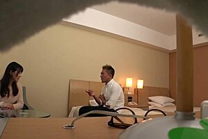 Japanese milf cosplayer bares huge natural tits for hotel shoots