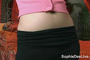 Sophie Dee flashes big jugs then fingers pussy on cam