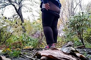 mature curvy milf squats peeing wet