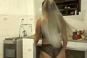 tanned hot stepmom in panties teases around the kitchen