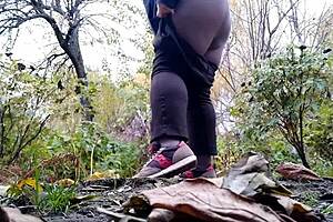 mature curvy milf squats peeing wet