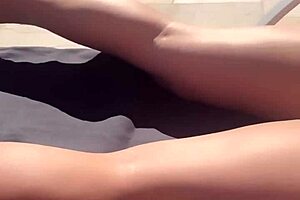 who's that horny blonde milf teasing in thong by the pool?