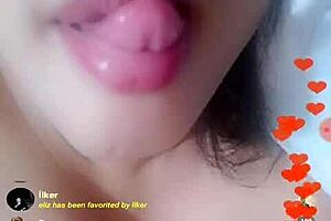 filipino babe teases on webcam with naughty moves