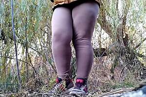 Milf In Tight Leggings Pees Desperately In Nature