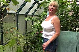 Rae Hart Waters Garden Plants in Wet Outdoor Tease