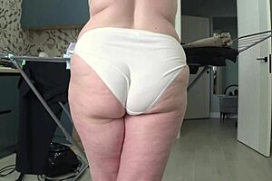 hey check out this busty curvy pawg wife in white panties on home cam behind scenes