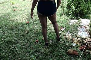 stepmom crams bottle deep in pussy amid jungle heat