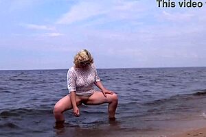 Blonde mature mommy slut flashes big ass curvy natural tits public beach young guys old young exhibitionist?