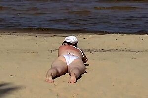 Blonde mature mommy slut flashes big ass curvy natural tits public beach young guys old young exhibitionist?