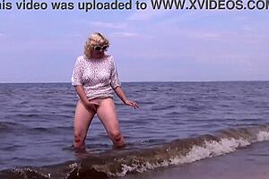 Blonde mature mommy slut flashes big ass curvy natural tits public beach young guys old young exhibitionist?