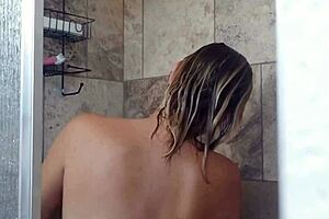HORNY PREGNANT BLONDE FUCKS herself deep with dildo in shower
