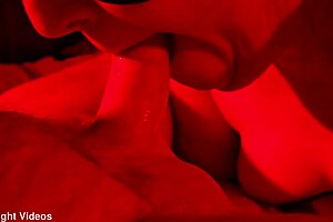 Hot close-up blowjob in red light quickie