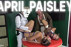 Blonde and brunette stars double team muscular Leia imposter in Star Whores orgy