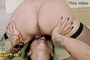 Horny lesbian couple enjoys licking shaved pussy and scissoring