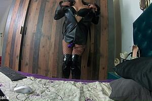 long black leather coat ripped pantyhose and vibrator tease