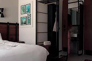 stepson and stepmom in a hotel room after a delayed flight