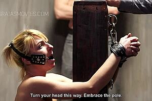 on knees for brutal whipping