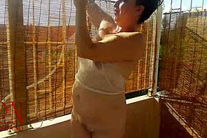 Hot summer terrace shower tease outdoors