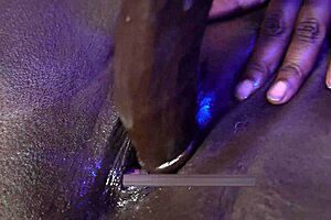 Ebony ssbbw hooker rams dildo up her wet black pussy