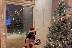 a neighbor brought gifts and fucked herself with a dildo at the christmas tree
