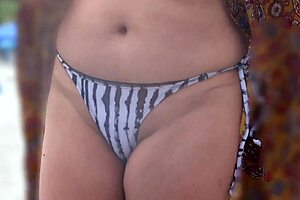 my stepson films me on the beach in bikini