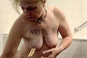esclave urinates publicly with pins and humiliation
