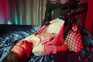 A rough mistress torments her skinny slave
