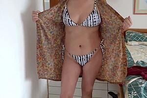 On the beach stepmother shows off her tits and pussy to stepsons friends