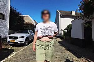 milf shows saggy tits on street