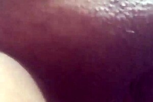 A mature milf enjoys solo play with her dildo.